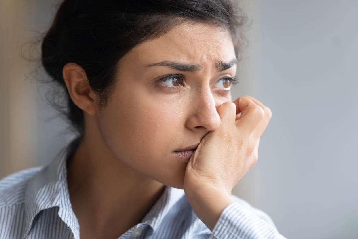 Person experiencing fibromyalgia relief through homeopathy